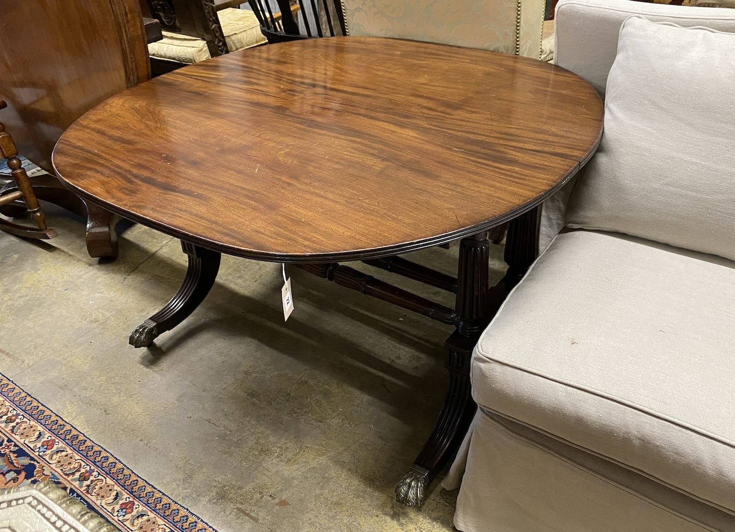 A George IV oval mahogany dining table (no leaves, altered), length 118cm, width 120cm, height 71cm